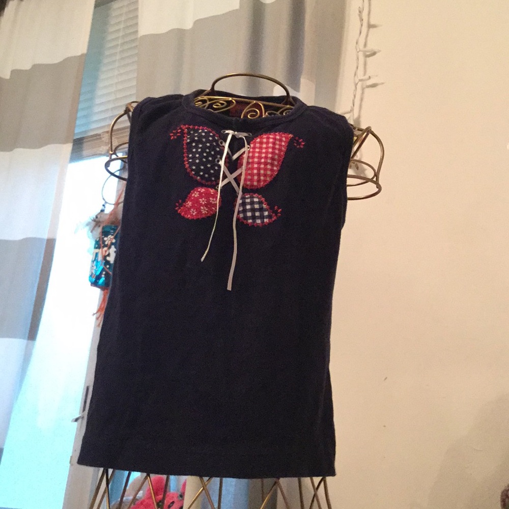 I am selling a cute blue tank top.